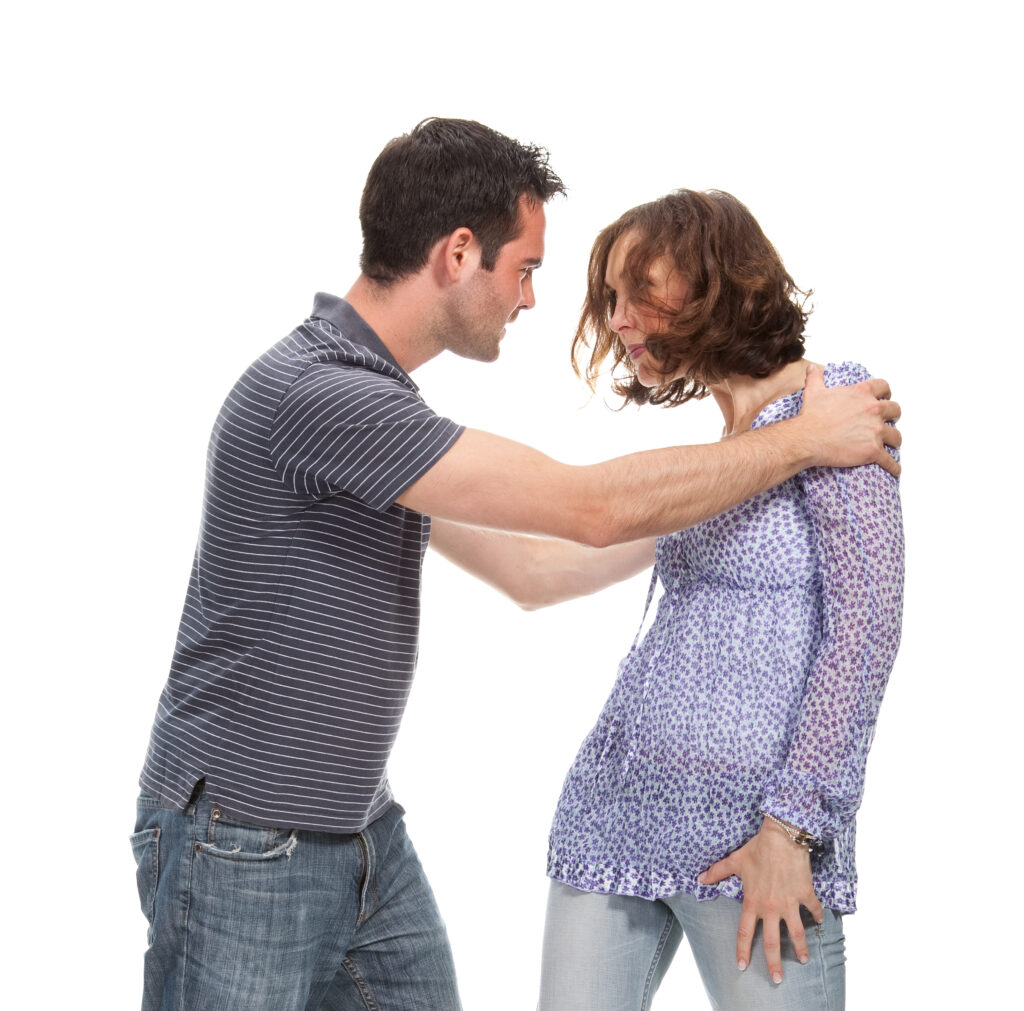 Angry couple yelling at each other